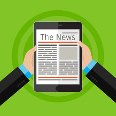 Businessman reading news at digital tablet.