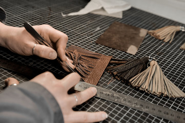 Trunk Maker at work in his luxury leather workshop