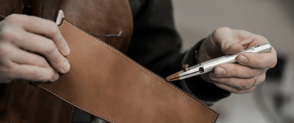 Trunk Maker at work in his luxury leather workshop