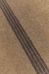Tire tracks on road