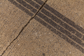 Tire tracks on road