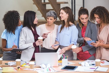 Group of interior designer interacting with each other