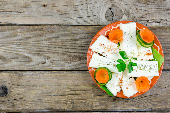 Cottage cheese with carrots and cucumber