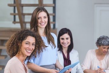 Portrait of interior designers smiling