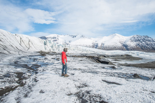 Tourist walk on the glacier of Skaftafell national park, Iceland.