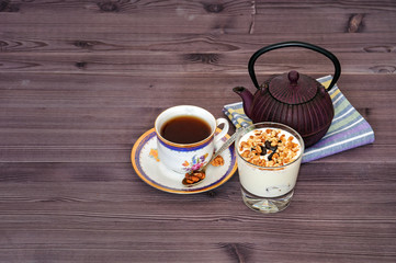 Prunes with walnuts in smetana. Russian dessert and tea.