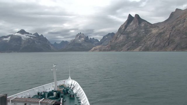 View across the bow of a ship transiting Prince Christian Sound, Greenland