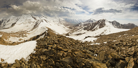 panorama of snowy peaks from the mountain top 