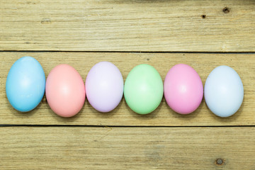 Easter eggs on wood background