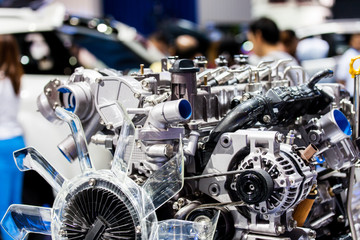 Fototapeta na wymiar part of new car engine for motorshow exhibition