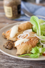 Fried cod and salad