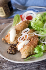 Fried cod and salad