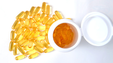 Omega 3 pills on a white background