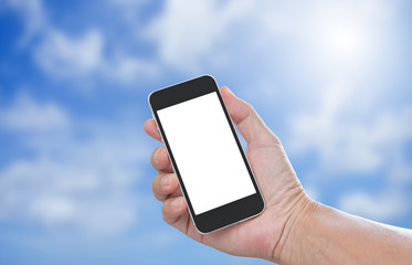 Hand holding blank screen mobile phone with blur blue sky backgr
