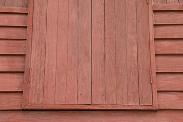 Naklejka na ściany i meble This s a picture of wooden wall of a house in the old period