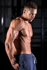 Cool young bodybuilder posing