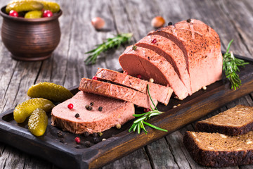 liver pate with cranberry, pickles and spices, close-up