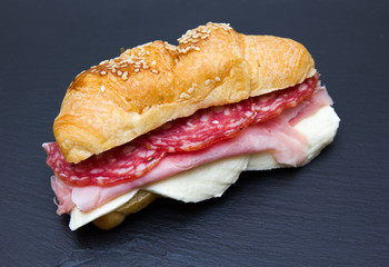 Cornetto savory filling with meats on slate top