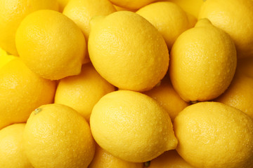 Wet lemons as background