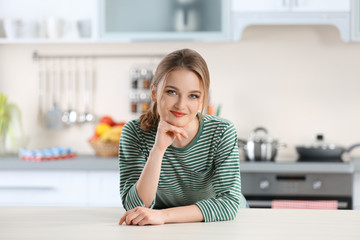 Young woman in the kitchen