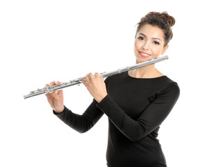 Beautiful young woman with flute isolated on white