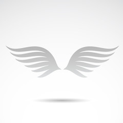 Wings vector icon on white background.
