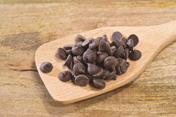 Chocolate chips on wood