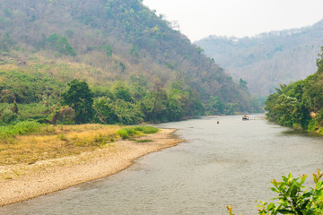 Fototapeta na wymiar Kok River in Taton Area, Mae Ai District, Chiang Mai, Thailand