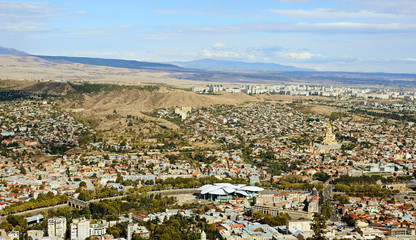 Obraz premium Panorama of Tbilisi, Georgia. Residential areas, the old churches and new creative buildings.