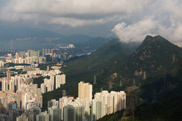 Obraz premium Hazy Hong Kong city skyline,an aerial view from Kowloon peak