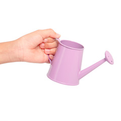 hand holding watering can isolated