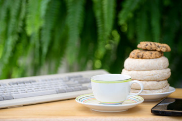 cup of coffee with brad cookie