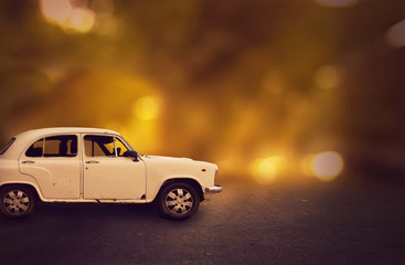 Fototapeta na wymiar Car on Road at night and bokeh background