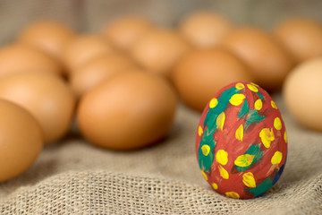 painted egg on burlap cloth
