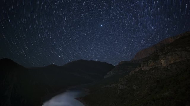 stars timelapse with lake