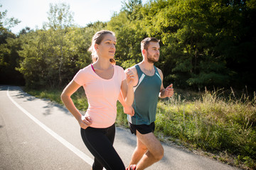 Friends jogging together