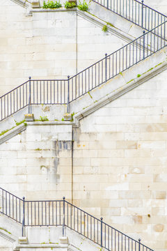 Banister and staircase on tall building