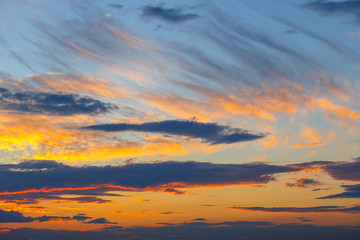 orange, blue and yellow colors sunset sky