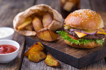 Burger with cold beer and fries