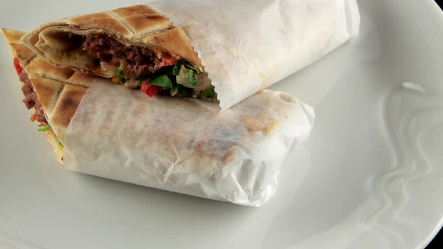 Turkish doner kebab, shawarma, roll with meat, loop
