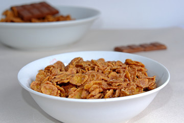 Cornflakes chocolate in a white bowl