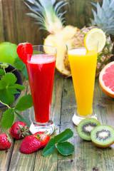 Strawberry and pineapple smoothies - vertical