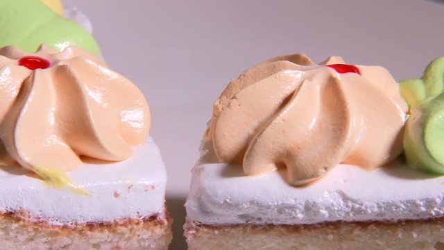 horizontal panorama a close up of cakes the movement at the left on the right 4k