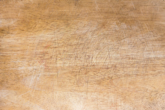 Fototapeta closeup of a worn wooden cutting board background