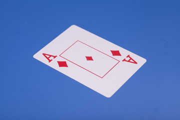 Ace of diamonds playing card,on blue background