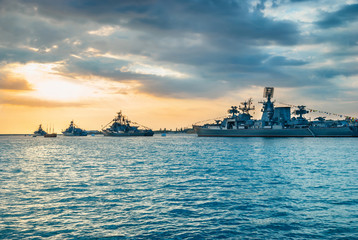 Military navy ships in a sea bay