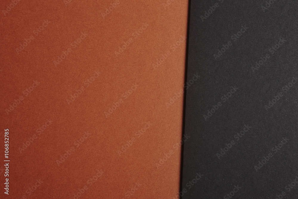 Wall mural colored cardboards background in brown black tone. copy space