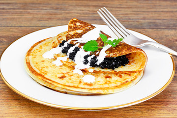 Pancakes with Black Caviar