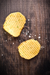 Corrugated potato chips and salt