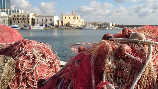 Fishing nets on the docks in the old port of Gallipoli, Italy
